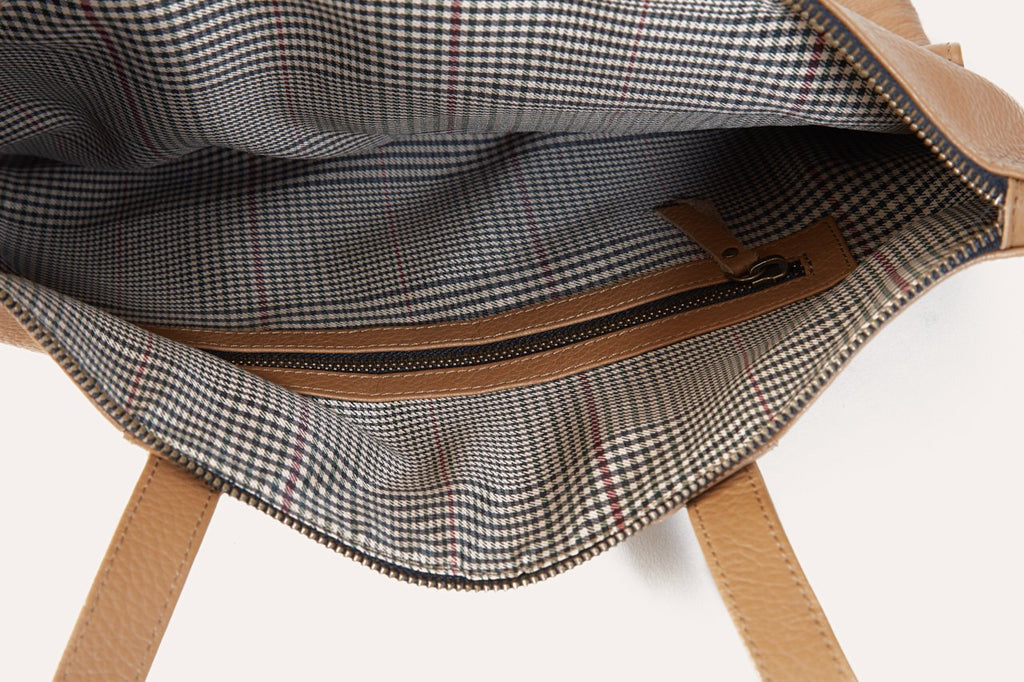 Kiko Fold n Hold Tote in cowhide leather with plaid lining and exterior pockets