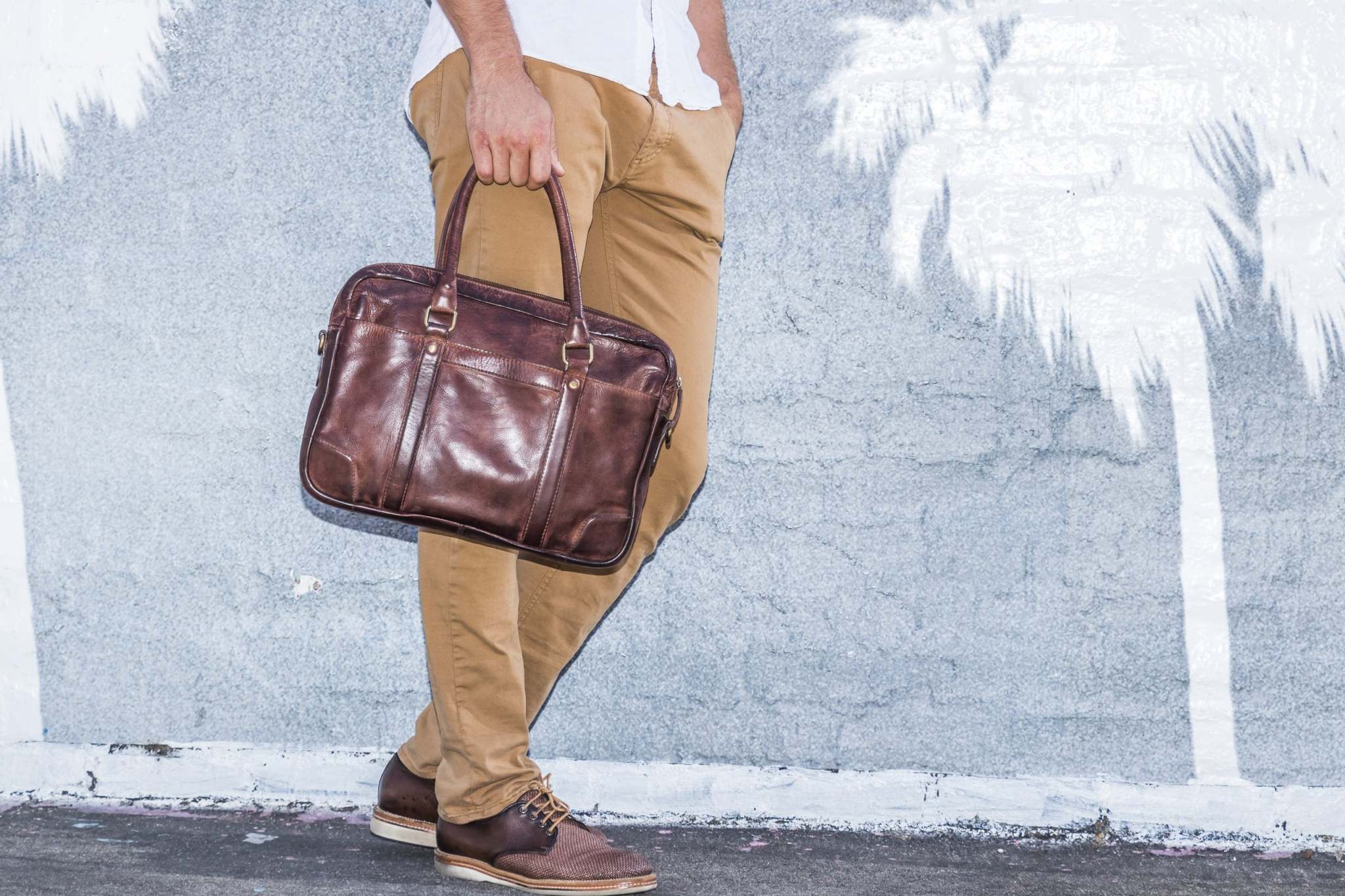 Kiko sleek briefcase made of genuine washed leather with external pockets and adjustable shoulder strap