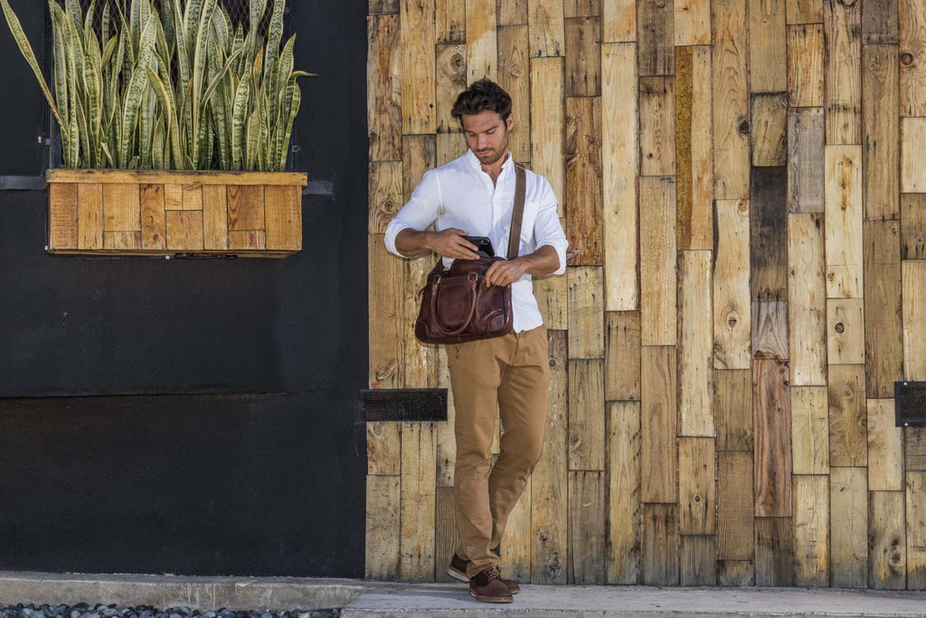 Kiko sleek briefcase made of genuine washed leather with external pockets and adjustable strap for laptops