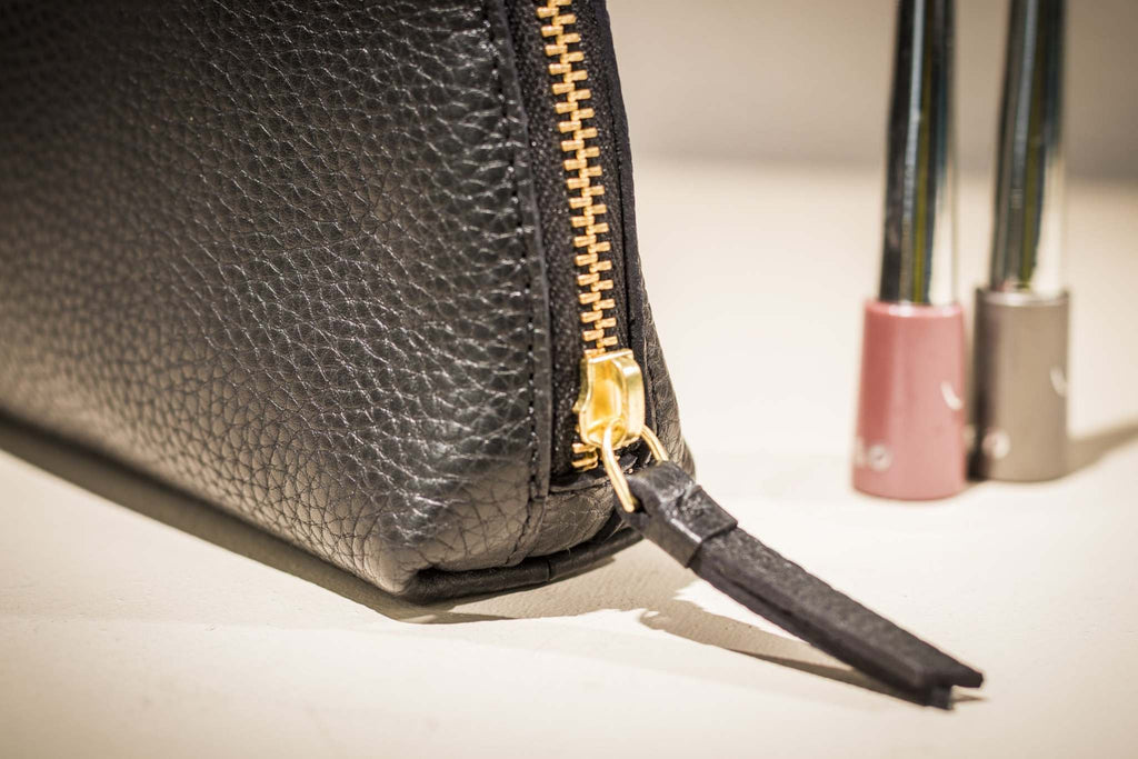 Medium genuine pebble leather travel case with zipper and internal pocket