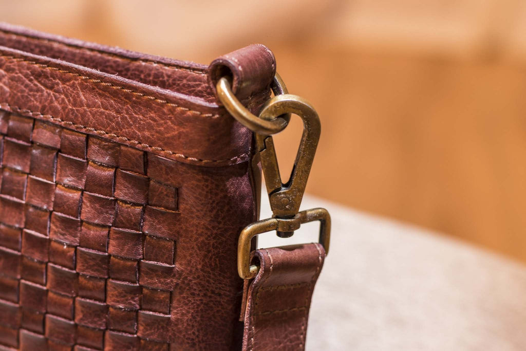 Kiko Weaved Crossbody Bag in genuine washed leather with adjustable strap and zip closure