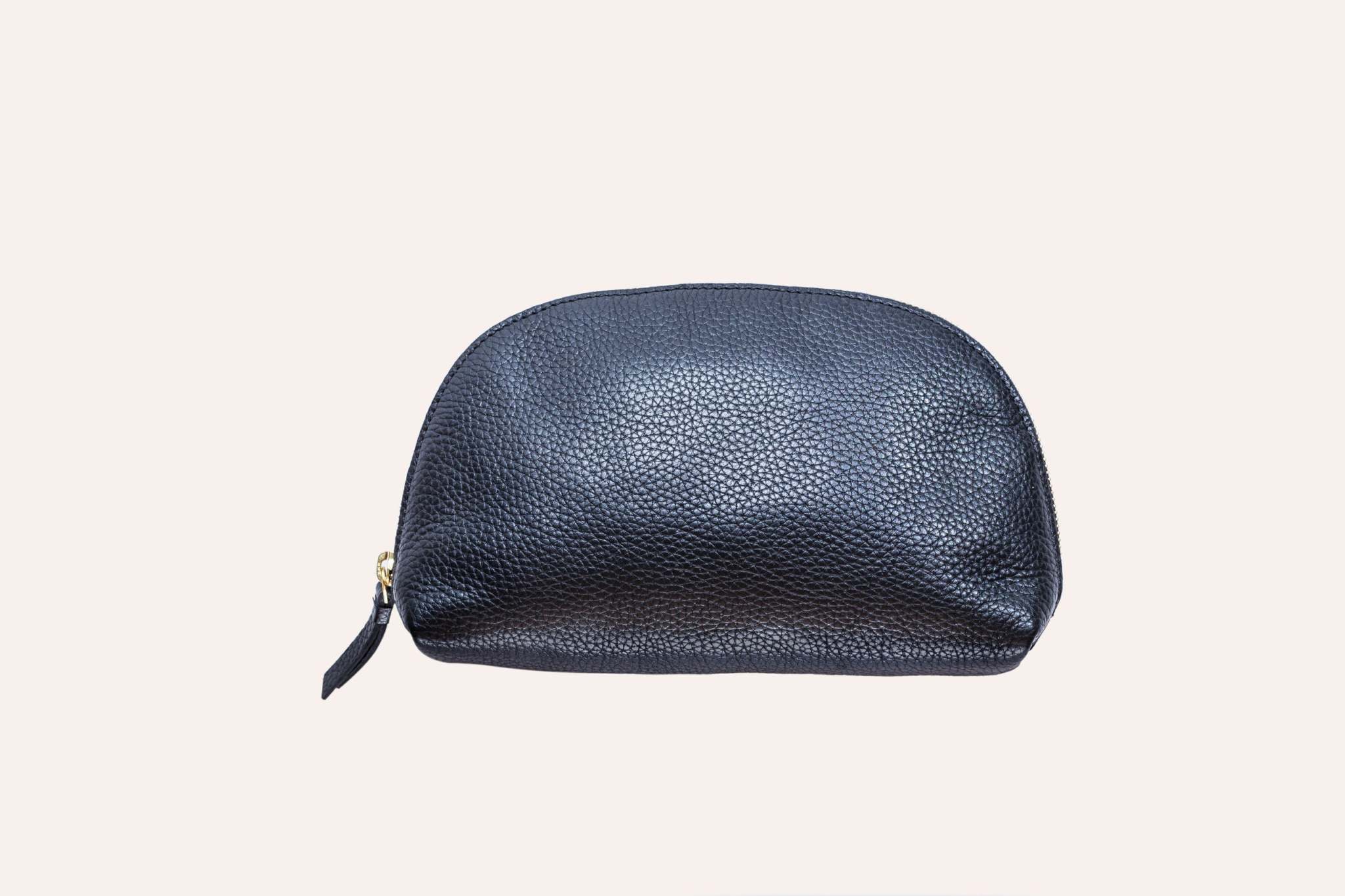Medium travel case in genuine pebble leather with zipper closure and internal pocket, measuring 5.75" x 9.25" x 2"