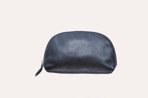 Medium travel case made of genuine pebble leather with zipper closure and internal pockets