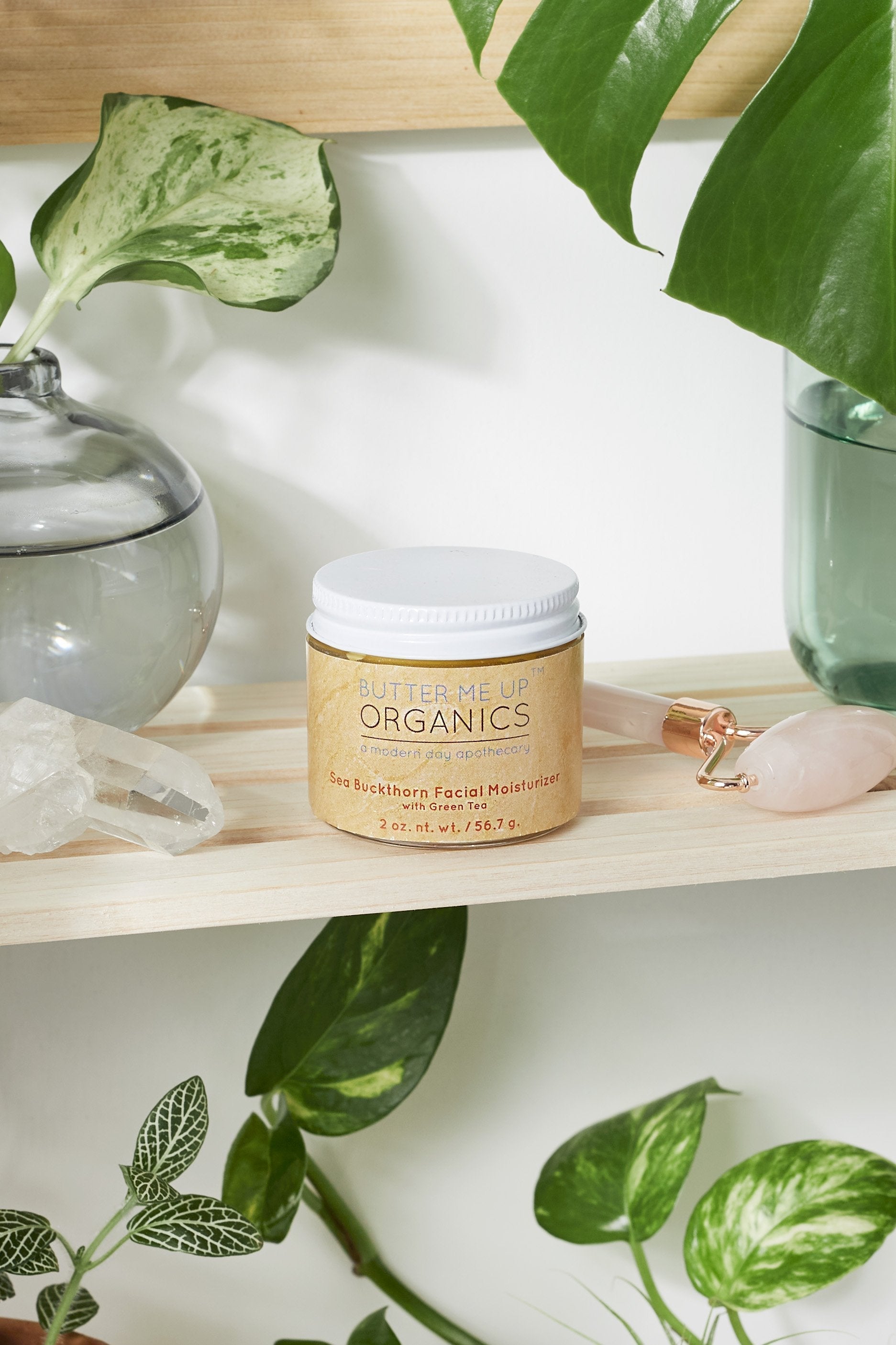 Organic Sea Buckthorn Facial Moisturizer in glass jar with metal lid