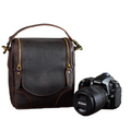 Handcrafted small leather camera bag Calista made of full-grain vegetable-tanned leather with adjustable strap and multiple compartments