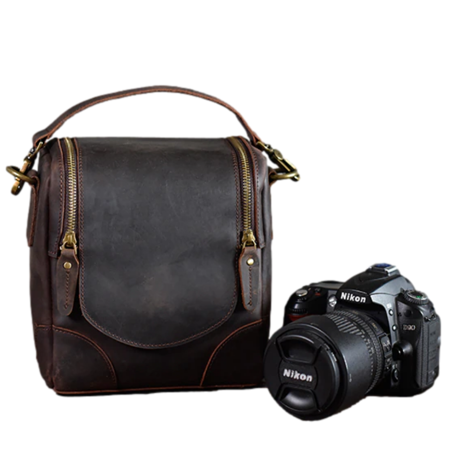 Handcrafted small leather camera bag Calista made of full-grain vegetable-tanned leather with adjustable strap and multiple compartments