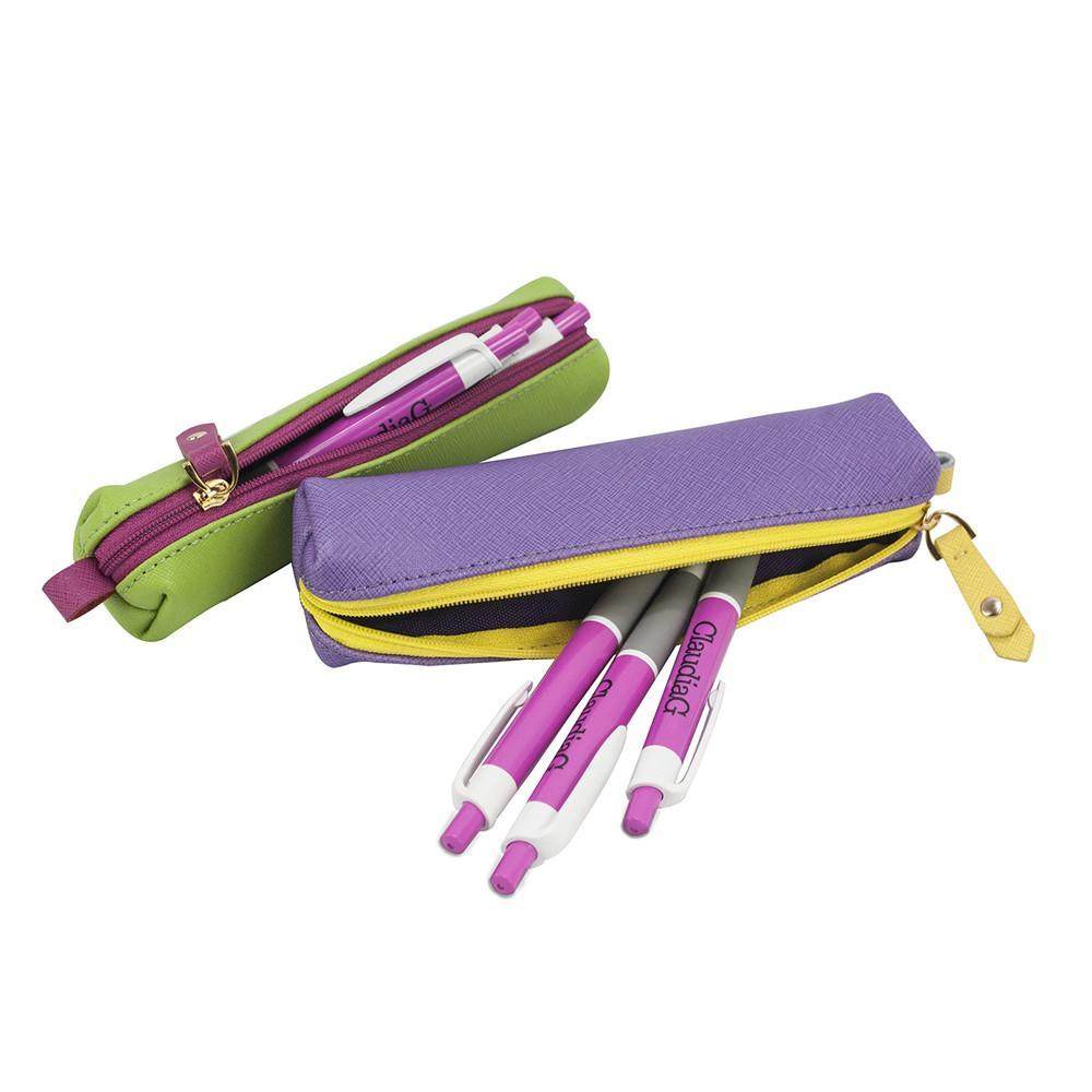 Elegant plum leather pouch with gold zipper and ClaudiaG logo, slim and elongated design for everyday essentials