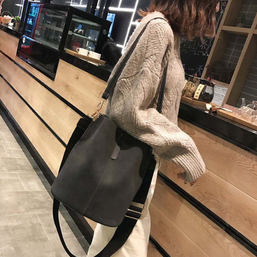 Black ClaudiaG Blake bucket shoulder bag made of vegan leather with adjustable straps