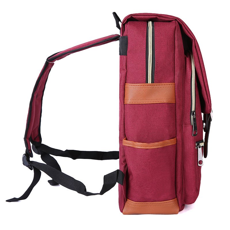 Vintage Laptop Backpack in burgundy Oxford fabric with tan trim, featuring vertical zip pockets, side compartments and adjustable black straps.