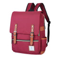 Vintage Laptop Backpack with burgundy canvas fabric, brown faux-leather trim, solid colour, flap closure and front zip pocket.