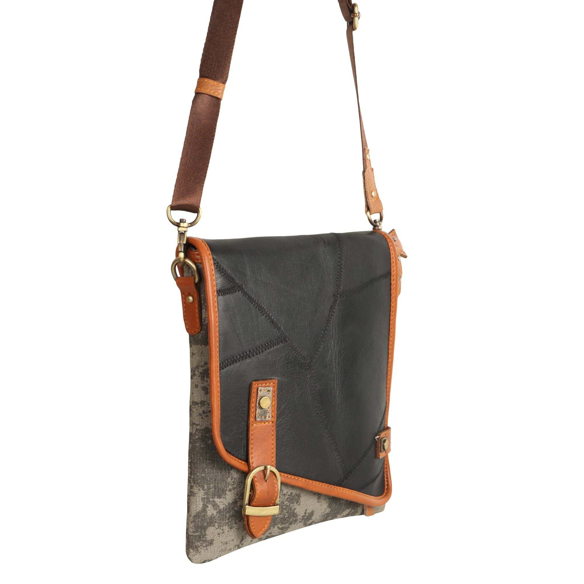 Vaan & Co Quest Crossbody Bag in carbon grey with asymmetrical flap and buckle closure made from upcycled leather and recycled canvas