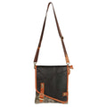 Vaan & Co Quest Crossbody Bag in carbon grey with asymmetrical flap and buckle closure made from upcycled leather and recycled canvas