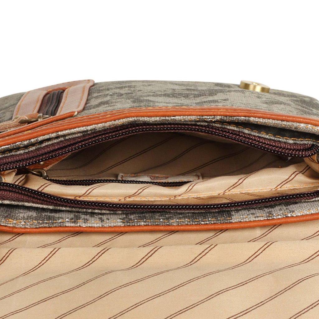 Vaan & Co Quest Crossbody Bag in Carbon Grey with asymmetrical flap and buckle closure made from upcycled leather and recycled canvas