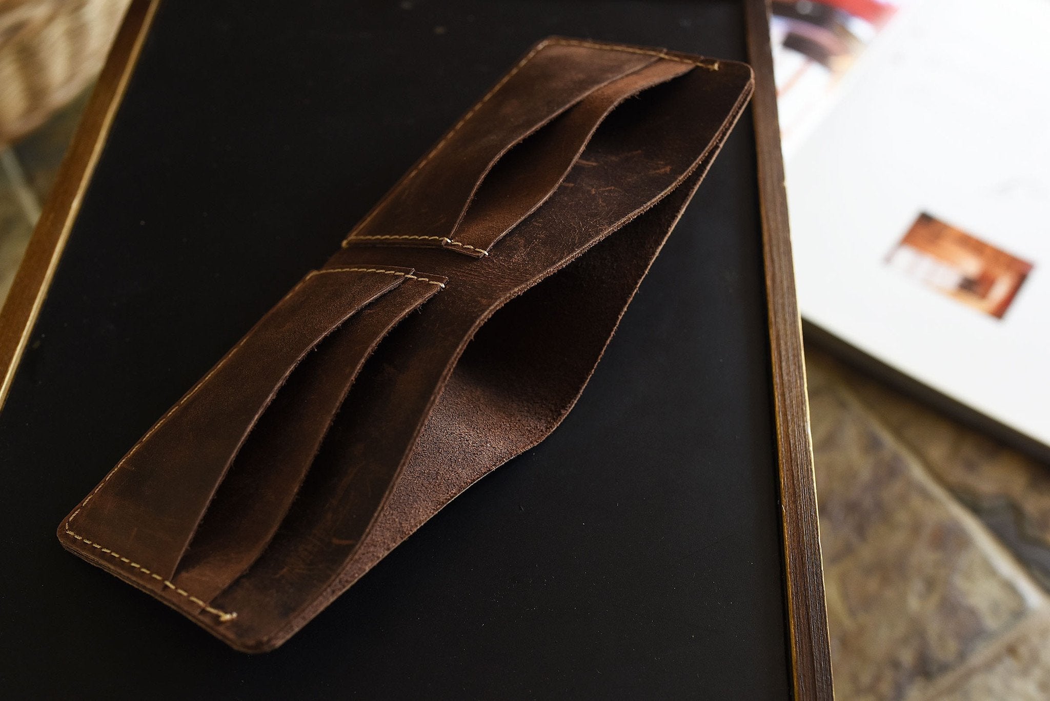 Kiko Straight Cut Bifold Wallet in dark brown distressed leather with four card slots and full-length bill compartment