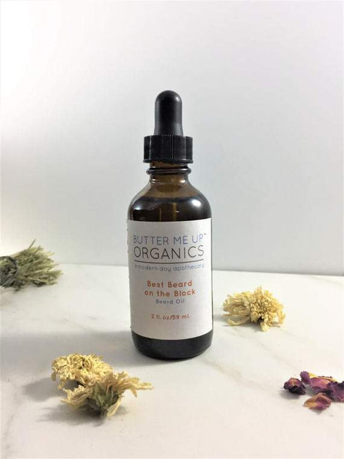 Best Beard On The Block organic beard oil in 2oz glass jar by Butter Me Up Organics with argan, jojoba, and cedarwood oils