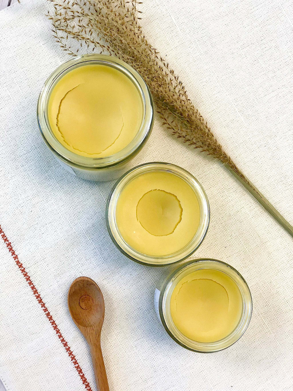 Glass jar of organic Healing Body Cream for dry skin by Butter Me Up with natural ingredients