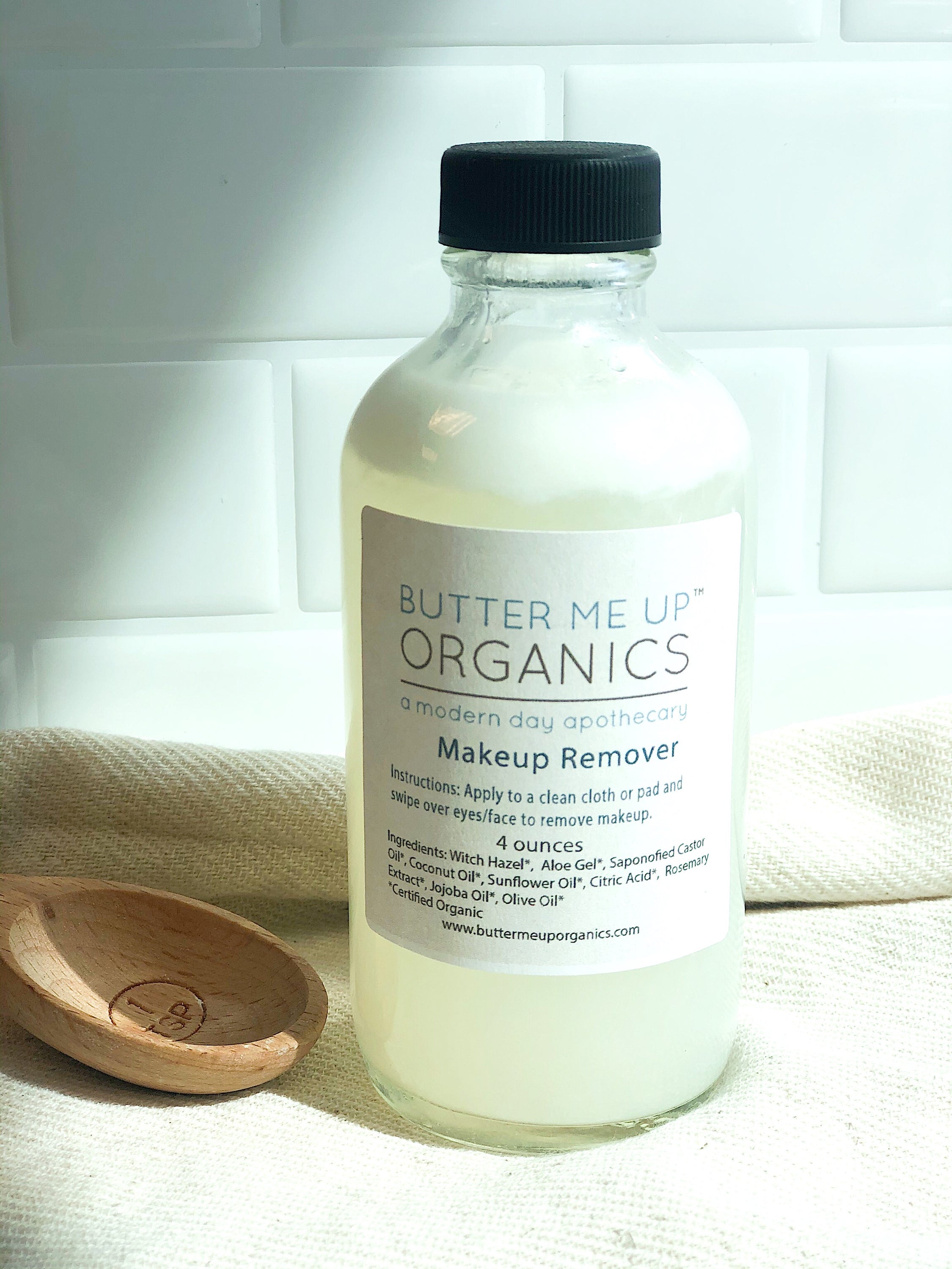 Organic makeup remover in 4 oz recycled glass bottle by Butter Me Up Organics