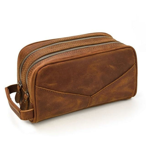 Genuine leather travel toiletry bag made from durable crazy horse leather with multiple pockets for organized storage.