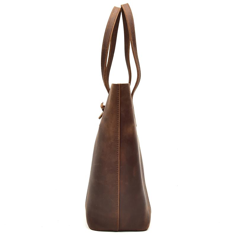 Handcrafted leather tote bag made from durable crazy horse leather with spacious compartments and ergonomic straps