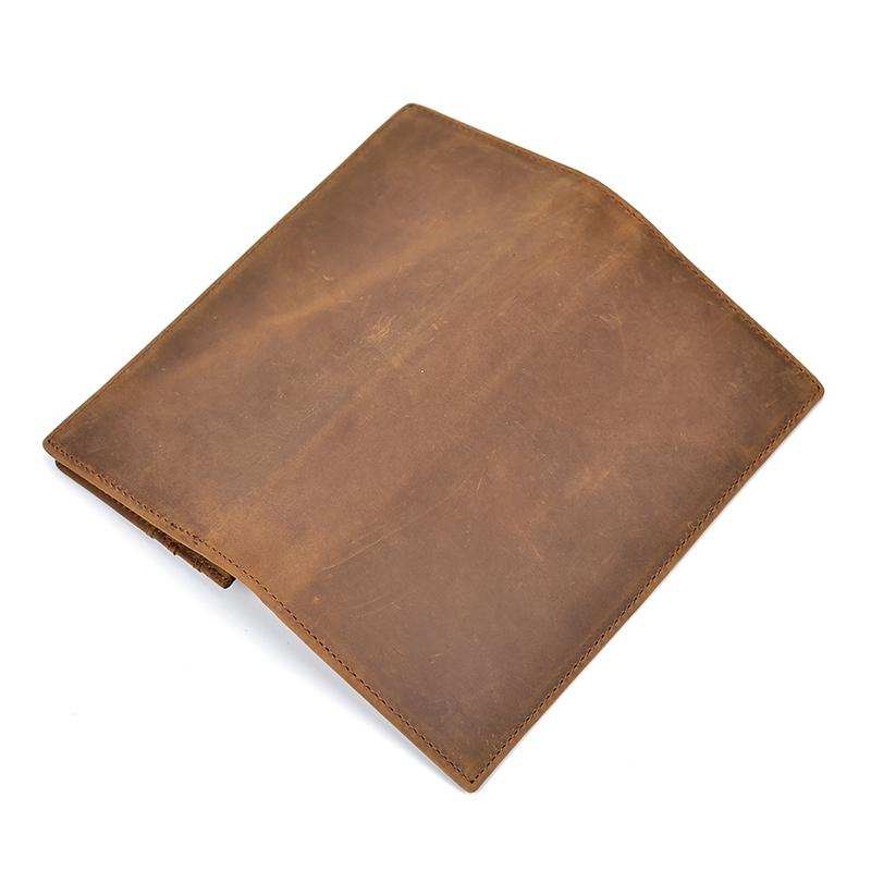 Sleek genuine leather bifold wallet with multiple card slots, clear ID window, zippered coin pocket, and long bill compartment for organized everyday carry