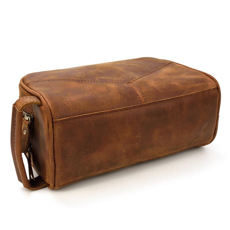 Genuine leather travel toiletry bag in brown crazy horse leather with multiple pockets and compact design