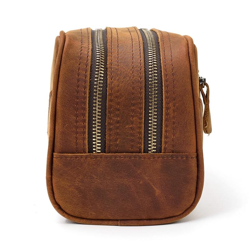 Genuine leather travel toiletry bag in brown crazy horse leather with multiple compartments for organized travel essentials