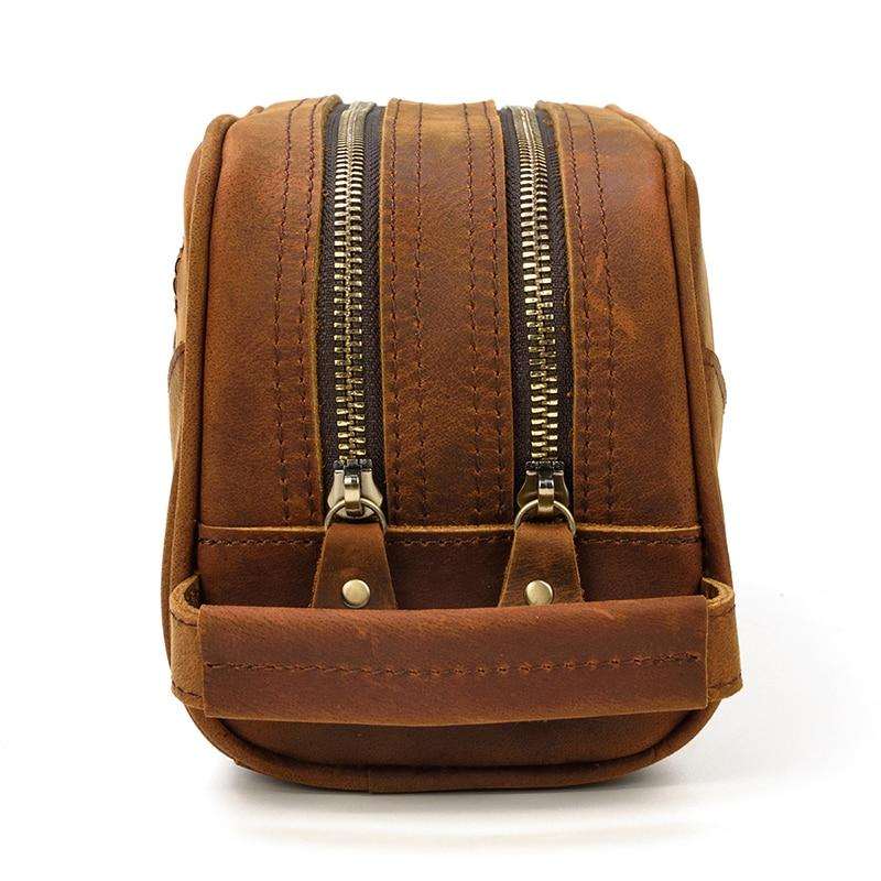 Genuine leather travel toiletry bag in brown crazy horse leather with multiple compartments for organized storage