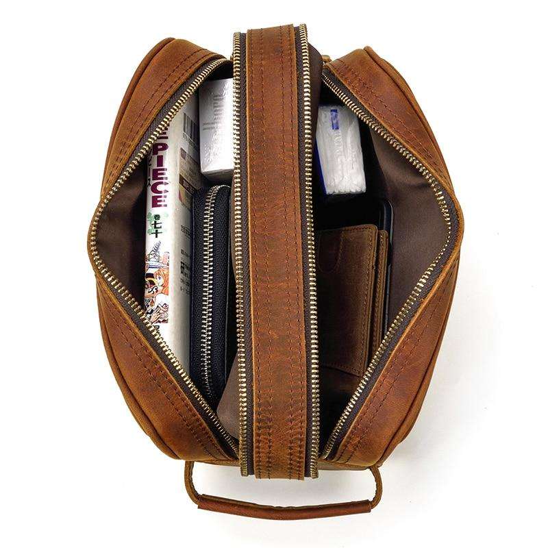 Genuine leather travel toiletry bag in brown crazy horse leather with multiple pockets for organized storage