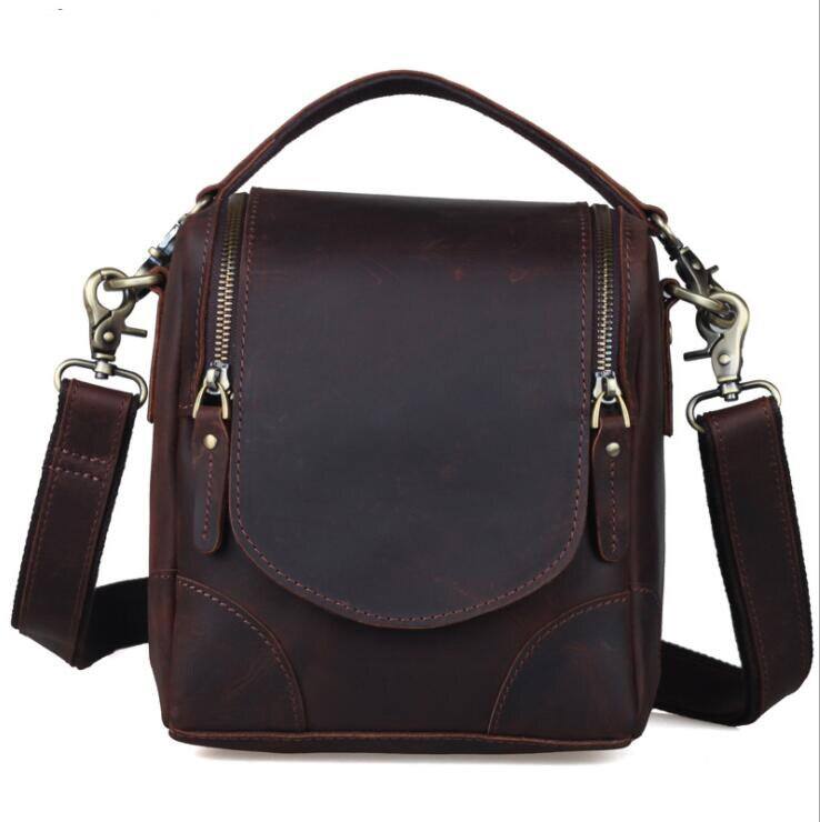 Handcrafted small leather camera bag Calista made of full-grain vegetable-tanned crazy horse leather with adjustable shoulder strap and multiple compartments.