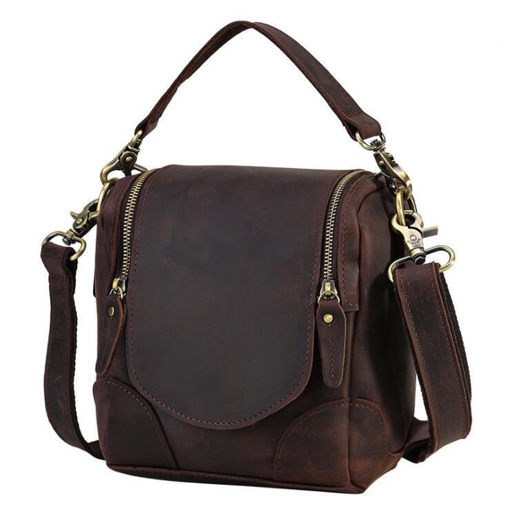 Handcrafted small leather camera bag Calista in full-grain vegetable-tanned crazy horse leather with adjustable shoulder strap and multiple compartments