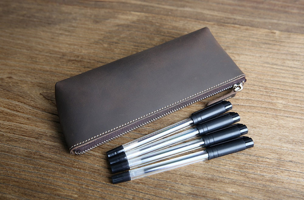 Handmade leather makeup bag in full-grain crazy horse leather with sturdy YKK zipper and sleek design