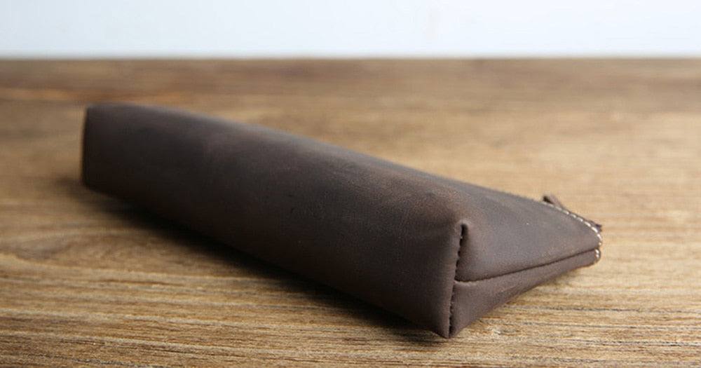 Handmade leather makeup bag in premium full-grain crazy horse leather with sturdy YKK zipper and sleek design