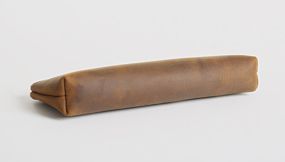 Handmade leather makeup bag in premium full-grain crazy horse leather with sturdy YKK zipper and sleek design