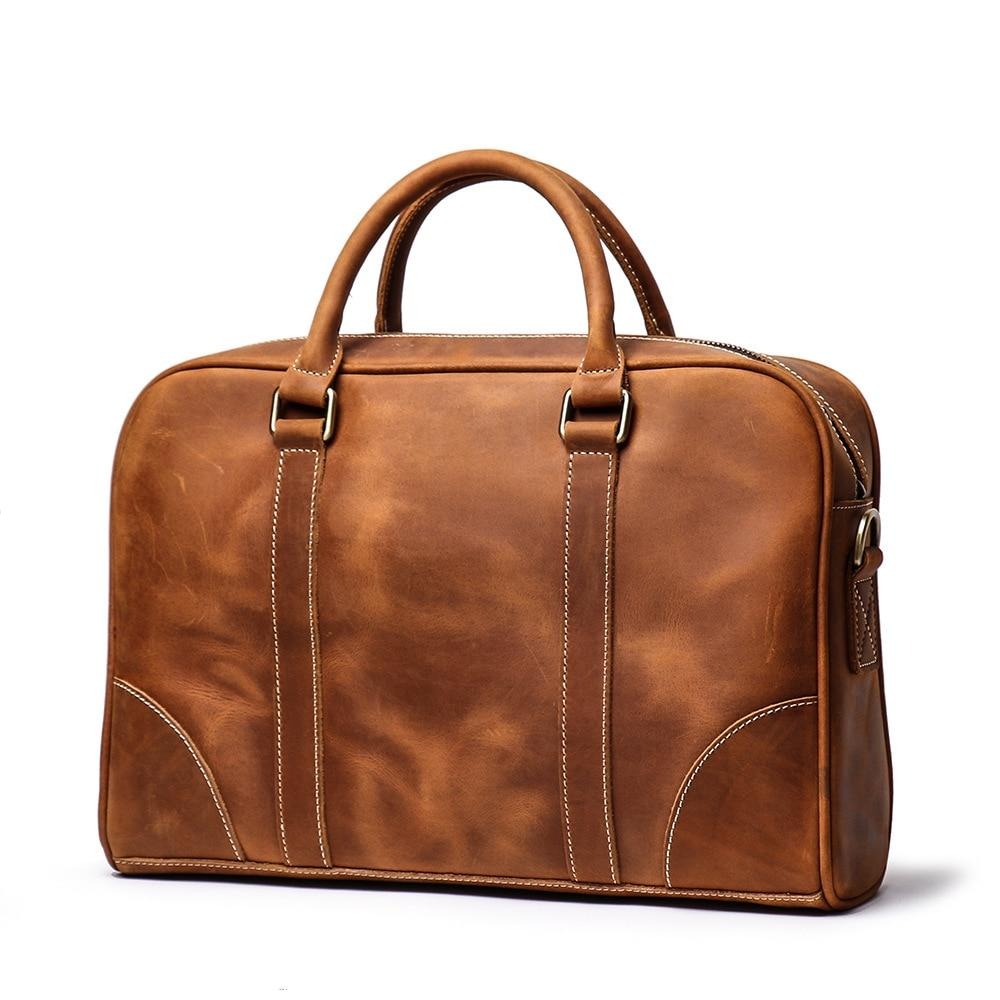 Vintage leather briefcase Bjorn in premium crazy horse leather with adjustable shoulder strap and spacious compartments for laptop and essentials