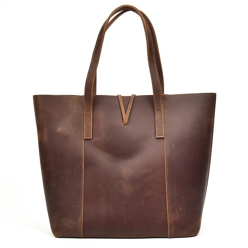 Handcrafted leather tote bag made from durable crazy horse leather with spacious compartment and removable clutch