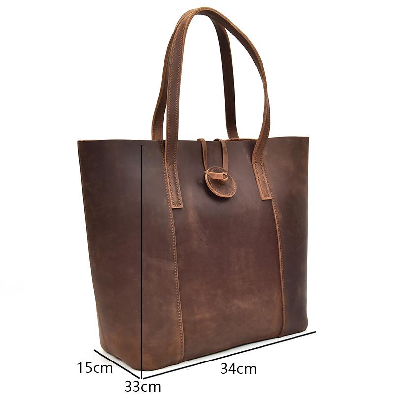 Handcrafted leather tote bag in crazy horse leather with ergonomic straps and removable clutch