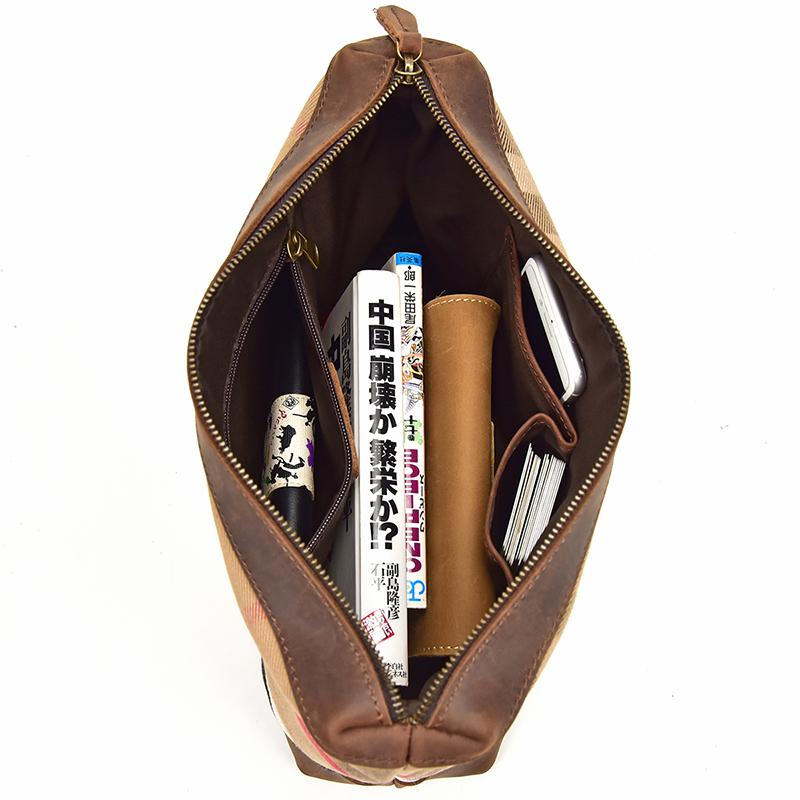 Handcrafted leather tote bag made of durable crazy horse leather with ergonomic straps and removable clutch