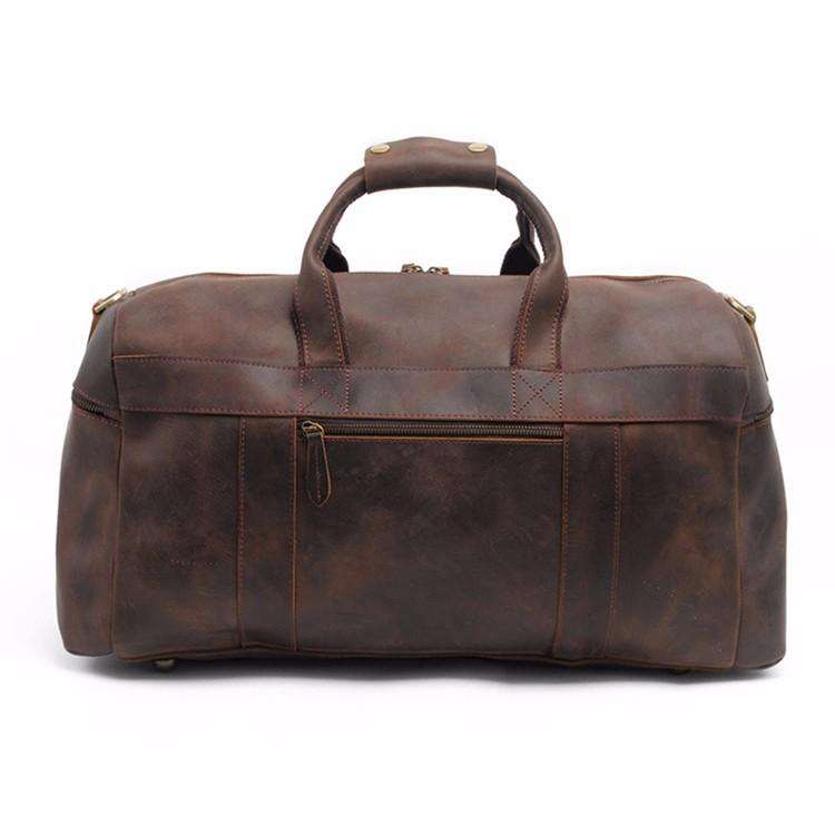 Handcrafted leather duffle bag in rich brown crazy horse leather with sturdy handles and zipper details