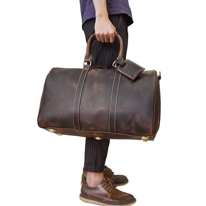 Bjarke Weekender handcrafted leather duffle bag with shoulder strap and laptop compartment