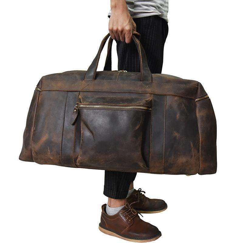 The Colden Leather Duffle Bag in premium crazy horse leather with soft cotton lining and multiple pockets for organized travel