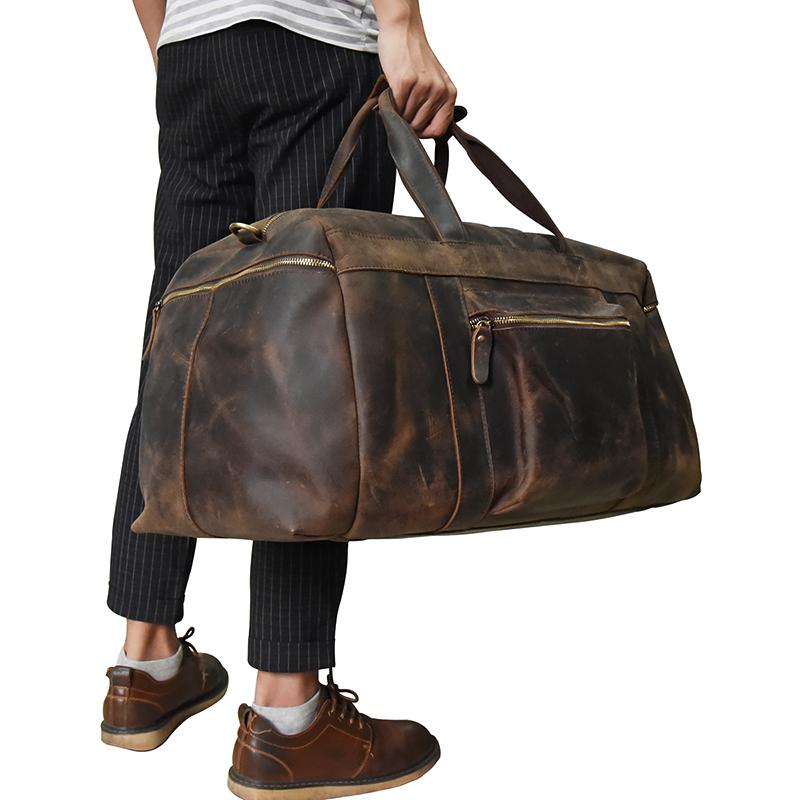 The Colden Leather Duffle Bag in premium crazy horse leather with spacious compartments and soft cotton lining.
