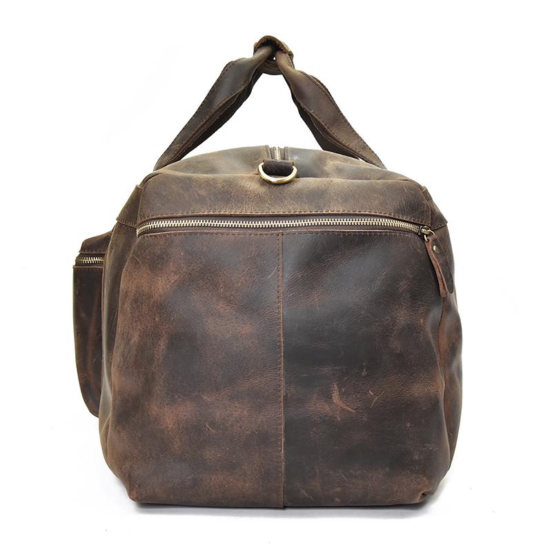 The Colden Leather Duffle Bag made of premium crazy horse leather with spacious compartments and adjustable shoulder strap.