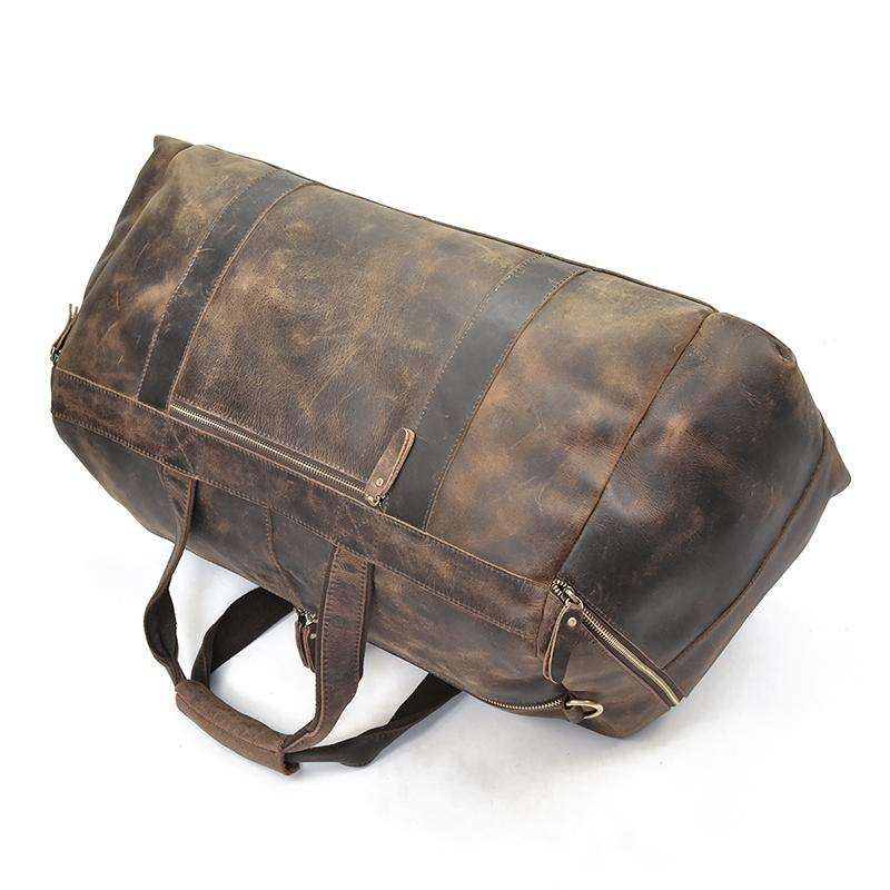 The Colden Leather Duffle Bag in premium crazy horse leather with soft cotton lining and multiple pockets for organized travel