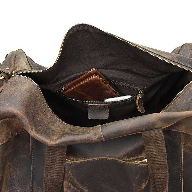 The Colden Leather Duffle Bag in premium crazy horse leather with soft cotton lining and multiple compartments for organized travel