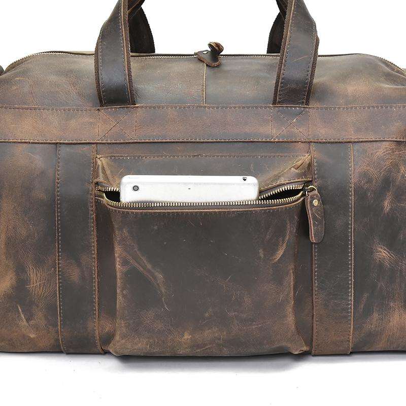 The Colden Leather Duffle Bag made from premium crazy horse leather with soft cotton lining and multiple pockets for travel organization