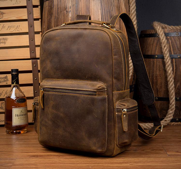 The Langley Genuine Leather Backpack in vintage rusted chocolate brown crazy horse leather with multiple compartments and adjustable straps