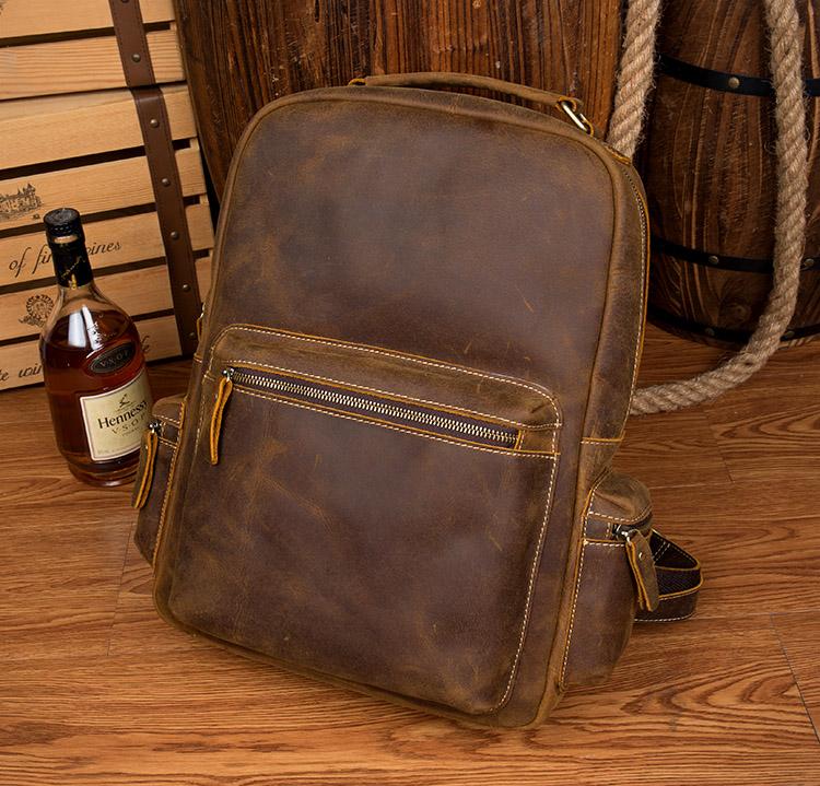 The Langley Genuine Leather Backpack in vintage brown crazy horse leather with multiple pockets and adjustable straps