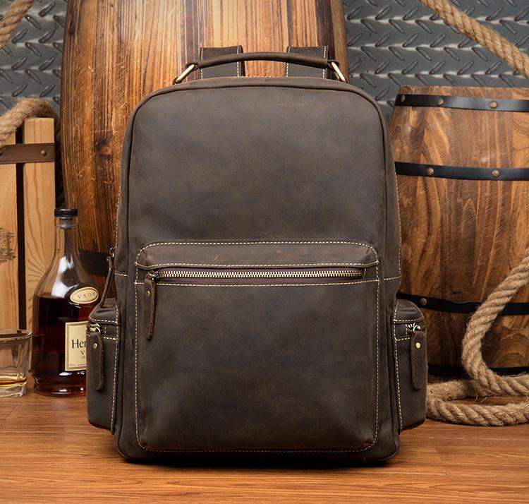 The Langley Genuine Leather Backpack in vintage brown crazy horse leather with multiple compartments and adjustable straps