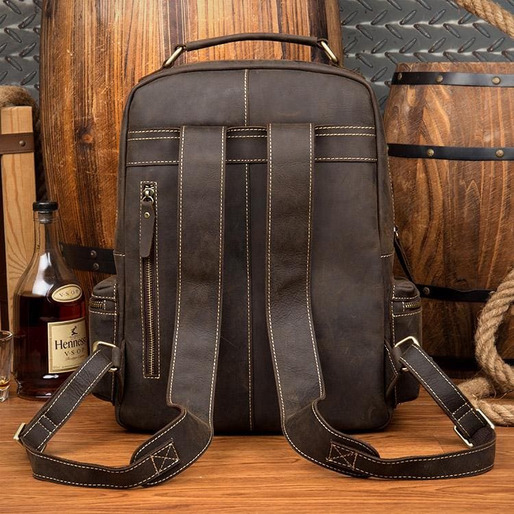 The Langley Genuine Leather Backpack in vintage brown crazy horse leather with multiple compartments and adjustable straps