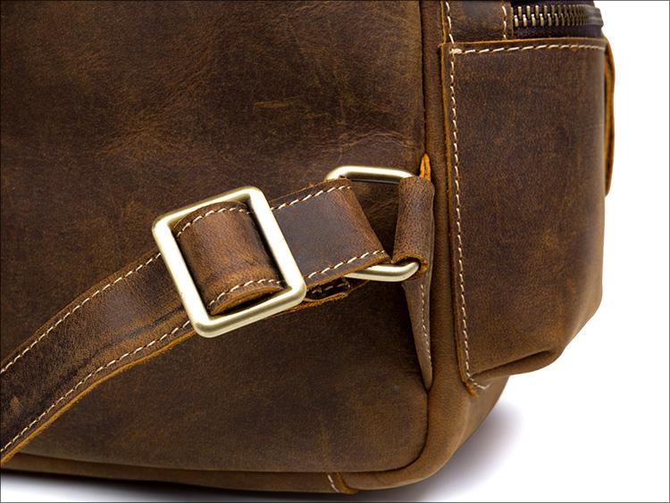 The Langley Genuine Leather Backpack in vintage rusted chocolate brown crazy horse leather with multiple compartments and adjustable straps